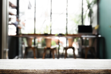 Empty wooden desk space platform with restaurant background for product display montage.