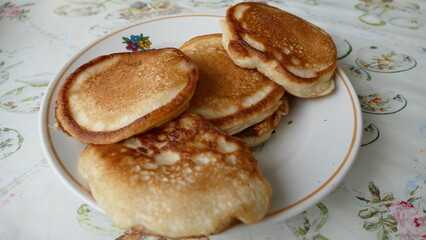 small pancakes on a plate for Breakfast