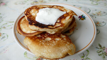 Obraz na płótnie Canvas small pancakes on a plate for Breakfast