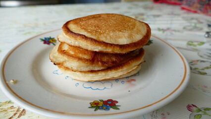 small pancakes on a plate for Breakfast