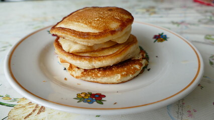 small pancakes on a plate for Breakfast