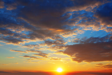Naklejka na ściany i meble sundial in the dusk , fantastic twilight with clouds ,. sunset over the horizon 