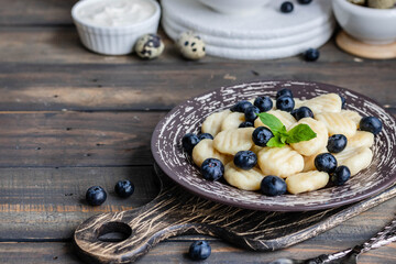 Lazy cottage cheese dumplings with fresh berry. Simple and healthy breakfast