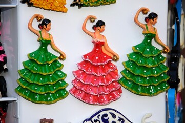 Three souvenir flamenco dancer fridge magnets, Malaga, Spain.