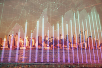 Forex chart on cityscape with tall buildings background multi exposure. Financial research concept.