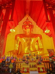 Ant's eye view of Phra Chao Ton Luang, Big Golden Buddha statue in buddhist temple, Wat Si Khom...