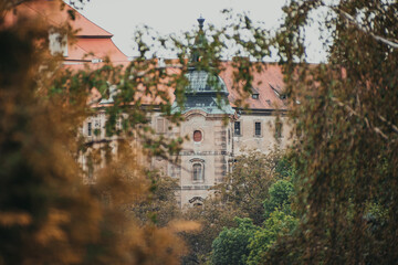 View through the leaves of trees to the Chotěšov Monastery - Czech Republic - Europe