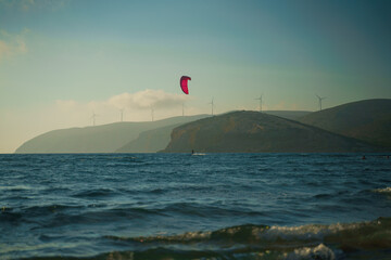 Kitesurfer riding on the waves at Prasonisi kite beach at Rhodes island