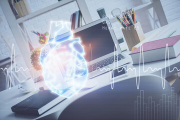 Desktop computer background and heart drawing. Double exposure. Medical study and healthcare concept.