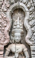 Apsara and Ta Prohm temple ruins, Angkor Wat complex, Siem Reap, Cambodia.
