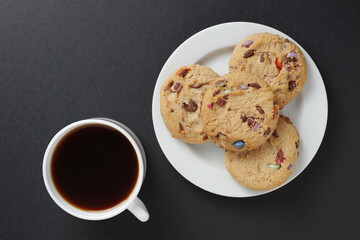 Cookies with chocolate sweets and coffee