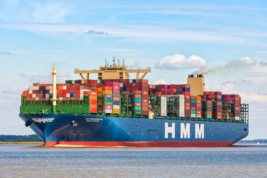 World's largest container ship HMM Algeciras on Elbe river