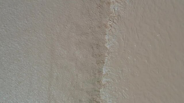 Flash Flood in the desert - Aerial Footage Swifts flying around wadi paran israel , Drone shot, Arava Desert, Israel.