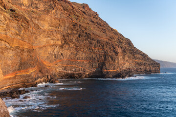 Obraz premium Volcanic cliff in sunset at La Palma Island