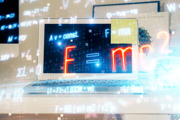 Desktop computer background and formula hologram writing. Double exposure. Education concept.