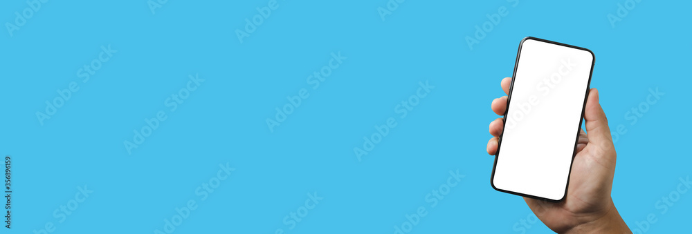 Poster man using mock up a cell phone with blank screen space banner