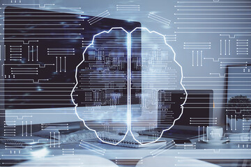Double exposure of table with computer and brain hologram. Data innovation concept.