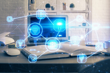 Computer on desktop with social network theme icon. Multi exposure. Concept of international connections.