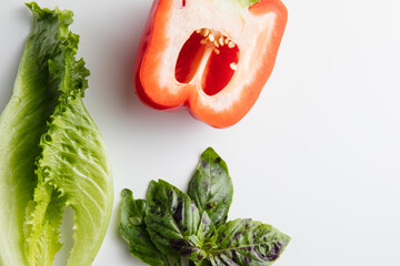 Salad and Basil on a white background. Minimum concept