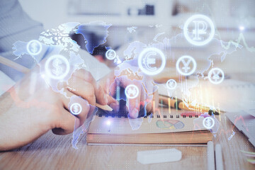 Multi exposure closeup hands with stock market forex graph.