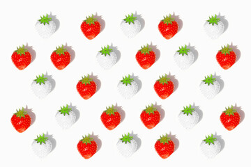 Strawberries white and red on a white background.