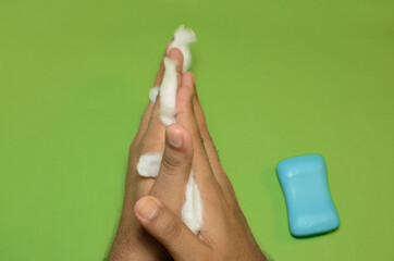 A man washing his hand for stop motion animation