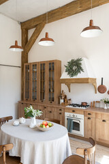 Wooden kitchen in modern interior with contemporary furniture