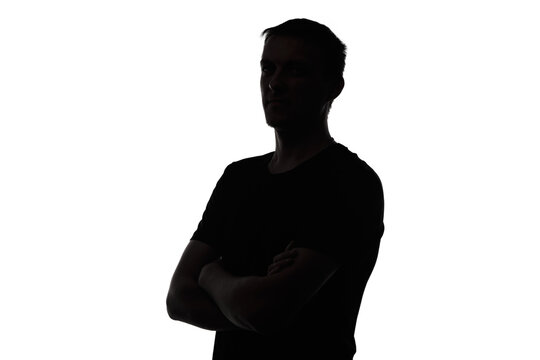 Photo of man's isolated silhouette with arms crossed