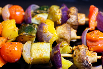 Vegetables skewers marinated in garlic and herbs sauce