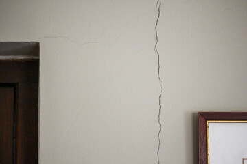 Large vertical crack in a wall