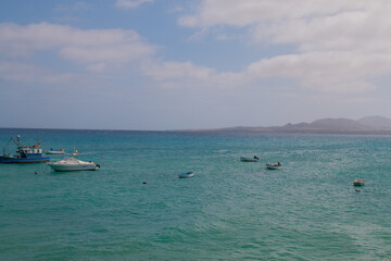 Pictures of the two main town (one the capital) in Lanzarote, Canary Island: Haria and Teguise, both with old white architecture and simple life. Typical are the  white houses with green windows 