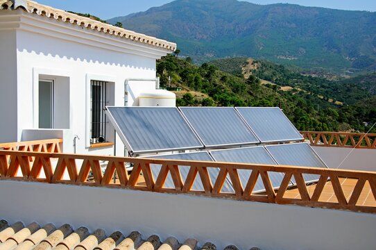 Solar panels on a rooftop terrace, Benahavis, Andalusia, Spain.