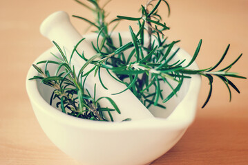 Rosemary in a mortar for cooking food