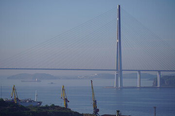 Fototapeta premium Seascape with a view of the Russian bridge and ships in the Bay.