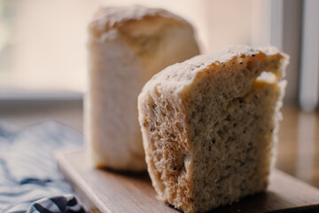Bakery concept. Fresh home-made bread on the table. Bread on wooden table. Homemade bread. 