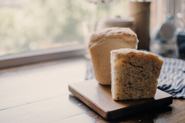 Bakery concept. Fresh home-made bread on the table. Bread on wooden table. Homemade bread. 