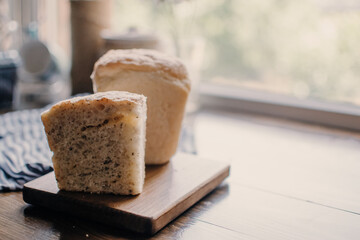 Bakery concept. Fresh home-made bread on the table. Bread on wooden table. Homemade bread. 