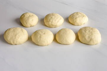 Fototapeta na wymiar A step-by-step cooking processs rolls, buns