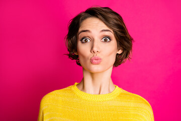 Close-up portrait of her she nice-looking attractive lovely pretty lovable cute shy girlish cheery girl sending air kiss isolated on bright vivid shine vibrant pink fuchsia color background