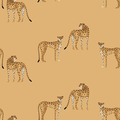 Abstract  seamless pattern with cheetahs on sand background. Vector illustration