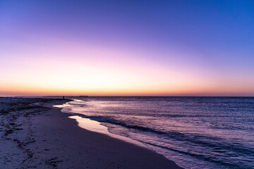 Sunset at the beach. Editing space. blue hour: blue, purple, yellow, orange colors. No people. Jurien bay, Western Australia WA, Australia, west coast