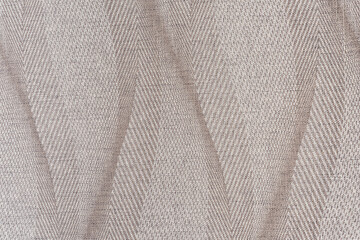 Beige canvas texture background with a wavy delicate pattern