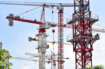 tower cranes on residental construction site