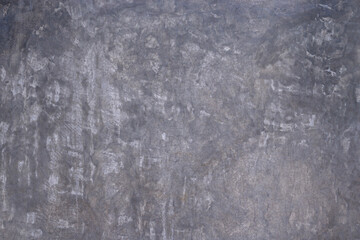 Close-up of the bare cement wall. Gray cement texture backdrop.