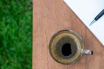coffee cup on wooden table.