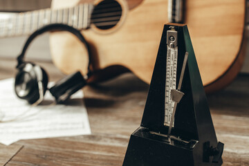 metronome on the background of the guitar