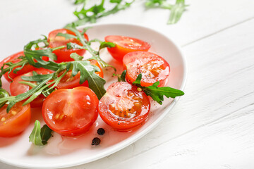 Fresh cherry tomatoes and arugula