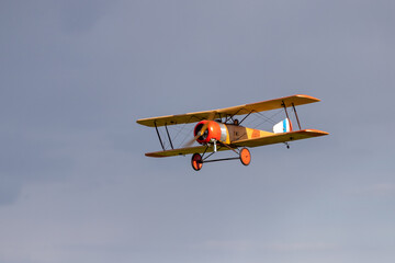R/C biplane airplane in the sky