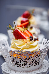 Holiday cupcakes with strawberries. Strawberry cakes