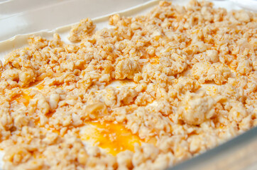 Cooking lasagna in a glass baking dish.